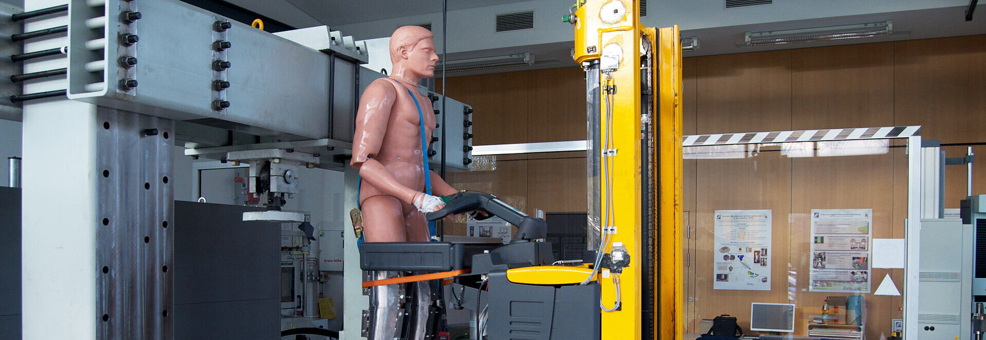Dummy elevated by a forklift.