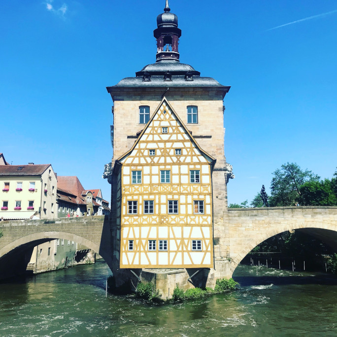 the old town hall in Bamberg, a half-timbered house standing on a bridge in a river