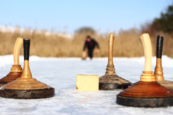 Wooden sticks on ice