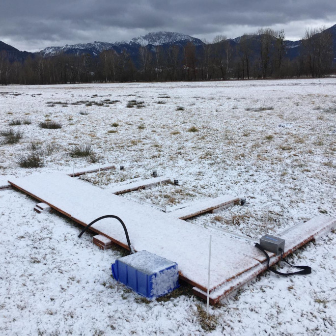 Measuring station in the fields covered in snow