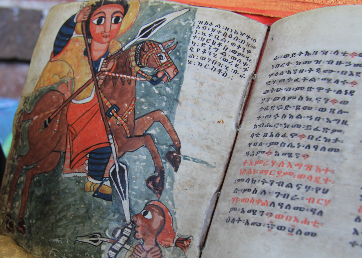 Old manuscript with illustration showing St. George.