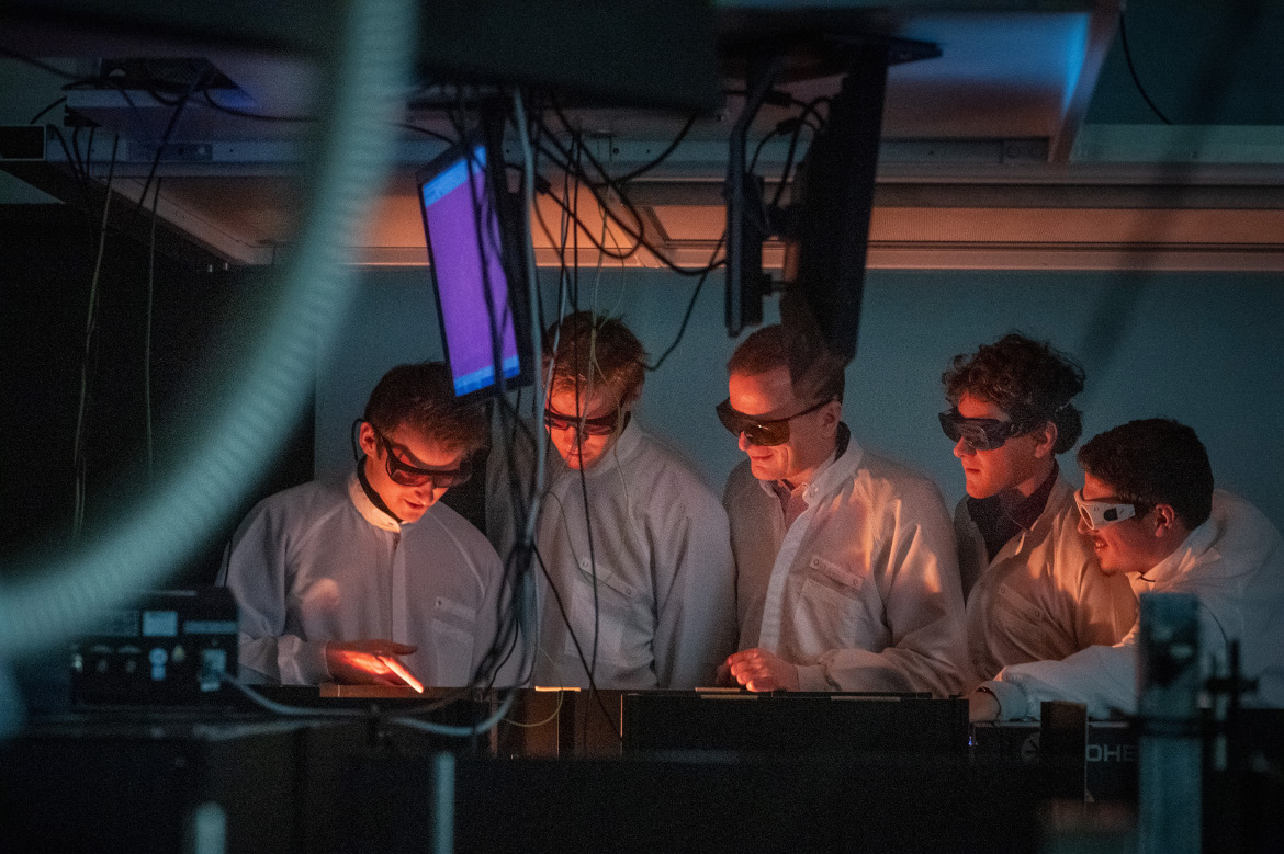 Prof. Huber and researchers in the Lab