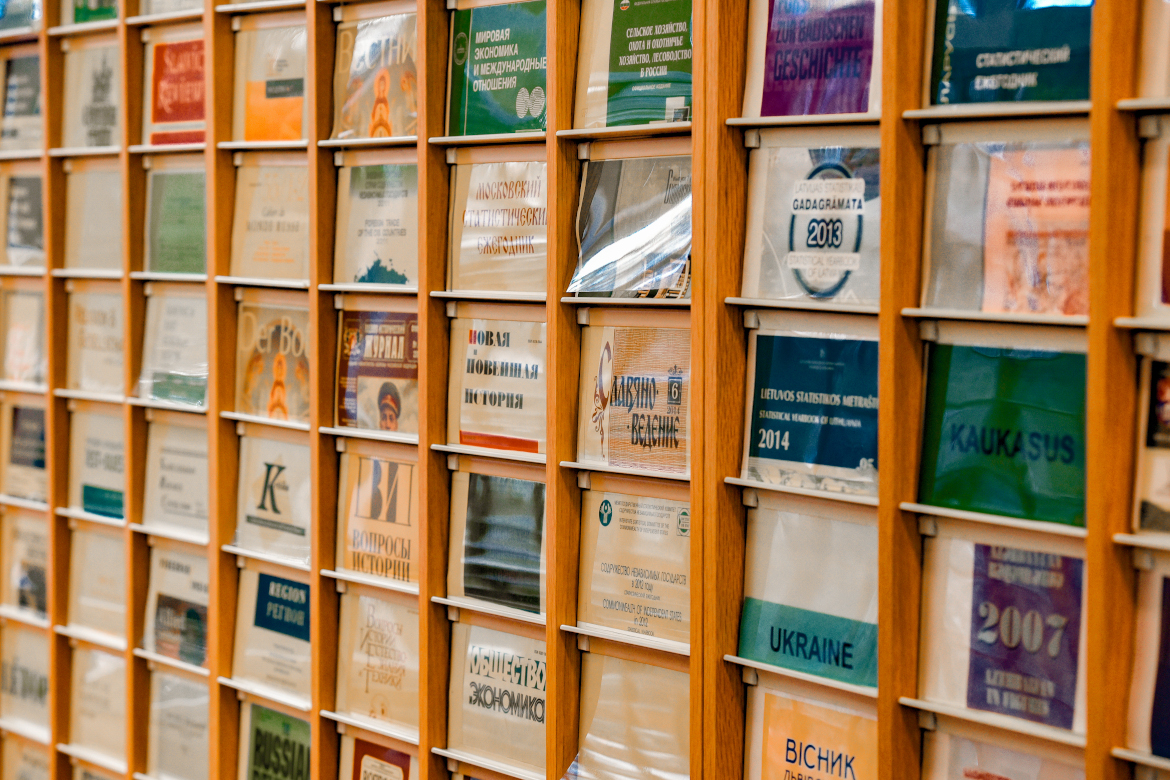 Close-up of scientific journals in different languages.