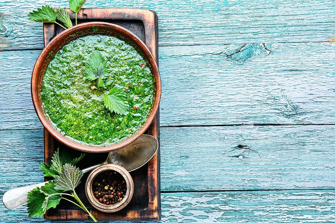 Green soup in a bowl