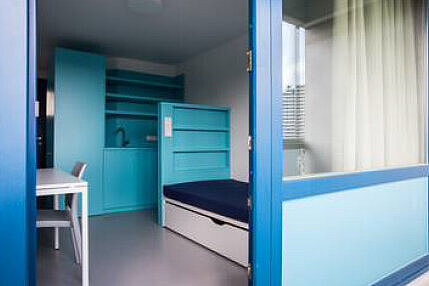 Door to furnished student apartment.