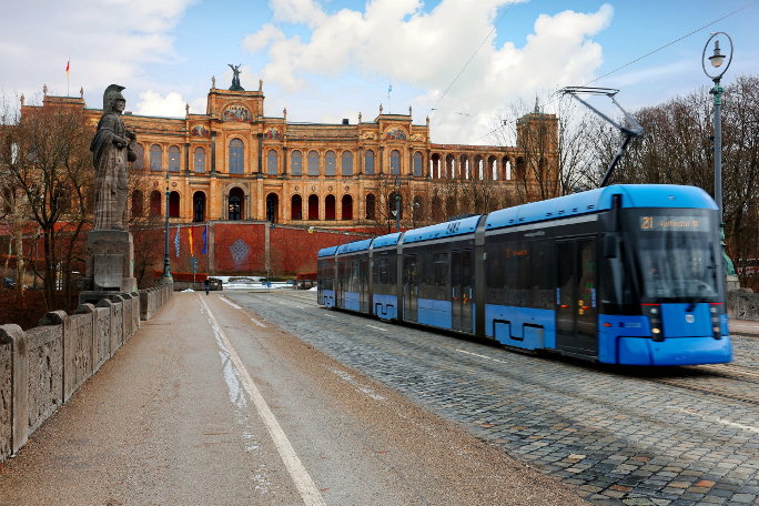 Tram crossing the Maximilian Bridge in Munich.