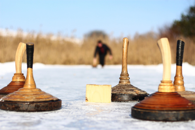 Wooden sticks on ice