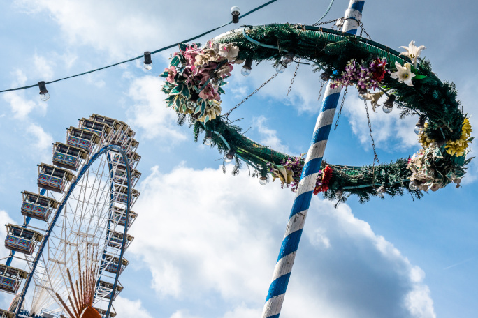 Maypole and ferries wheel in the background