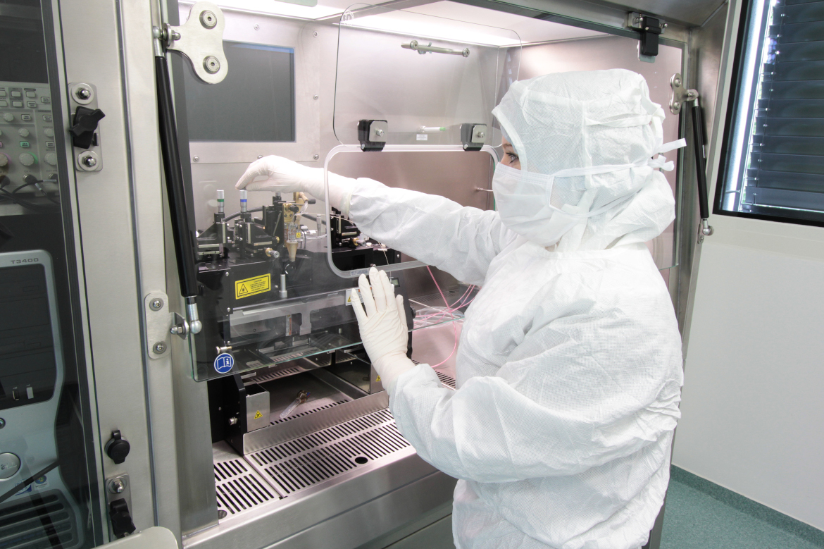 Researcher in white gowns working in a Laboratory